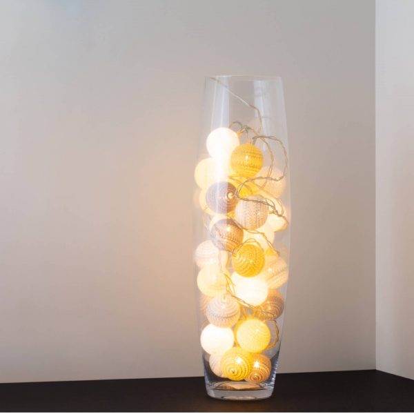 A white rose themed LED cherry light in a clear glass vase.