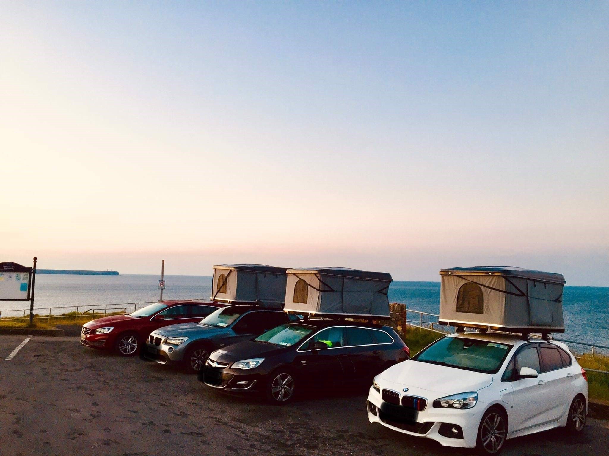 group of roof tent campers parked up